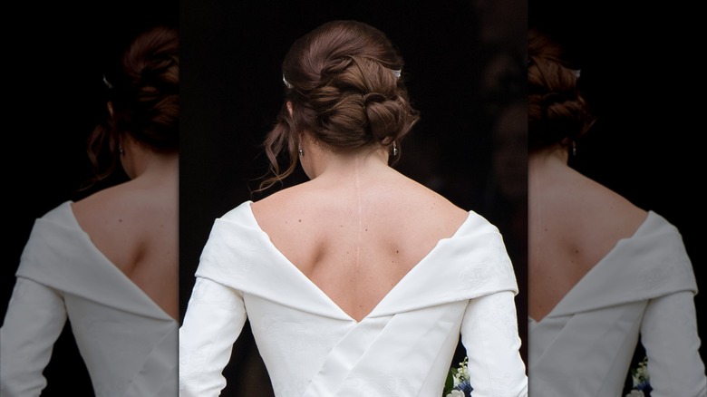 The back of Princess Eugenie's wedding dress, revealing her scoliosis scar