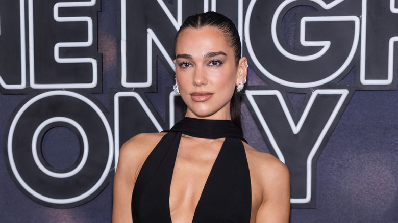 Dua Lipa posing at an event
