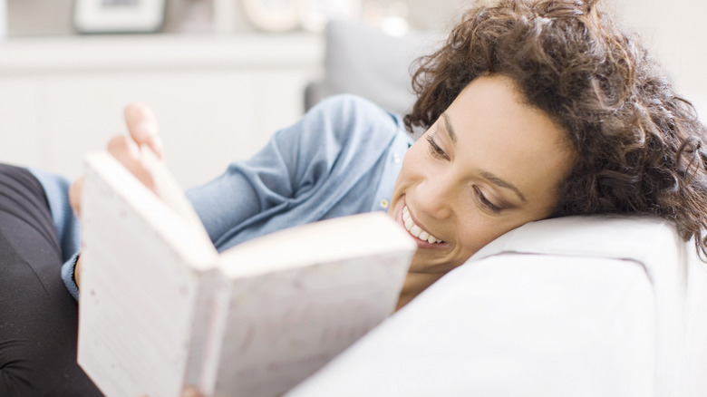 woman enjoying her book