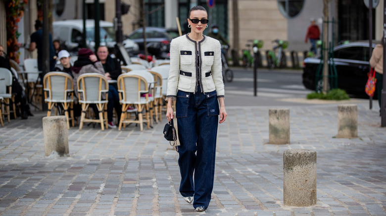 woman in dark-wash jeans 