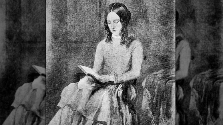 Portrait of Charlotte Brontë reading a book