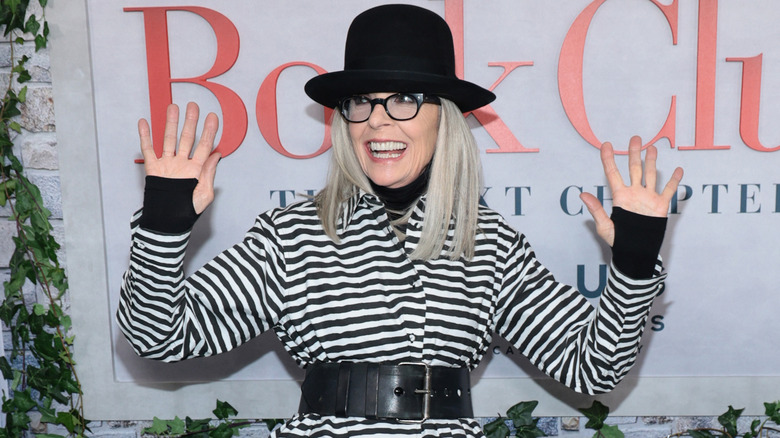 Diane Keaton smiling on the red carpet of Book Club premiere in 2023.