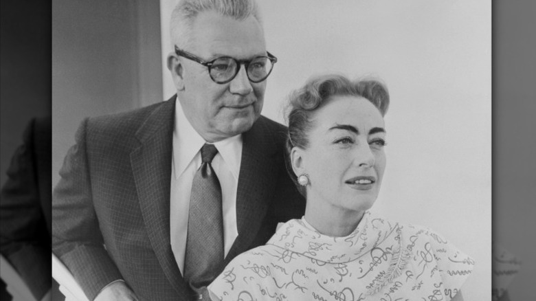 Alfred Steele and Joan Crawford in a black-and-white photo on their honeymoon.