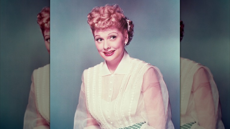 A colorized studio portrait of Lucille Ball in 1955.