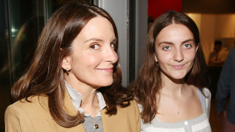 Tina Fey posing with her daughter Alice