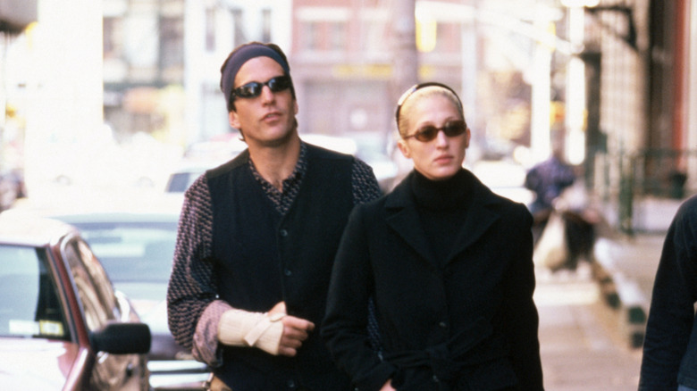 John F. Kennedy Jr. walking with Carolyn Bessette-Kennedy in New York City