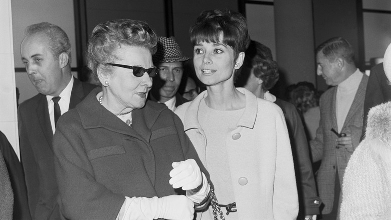 Audrey Hepburn and her mother Ella van Heemstra pictured wearing peacoats before the Academy Awards in 1965