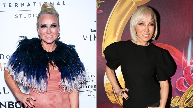 Margaret Josephs wearing a feathered cape and a black dress