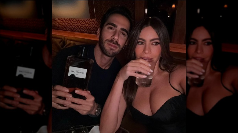 Sofía Vergara and Douglas Chabbott posing with a drink