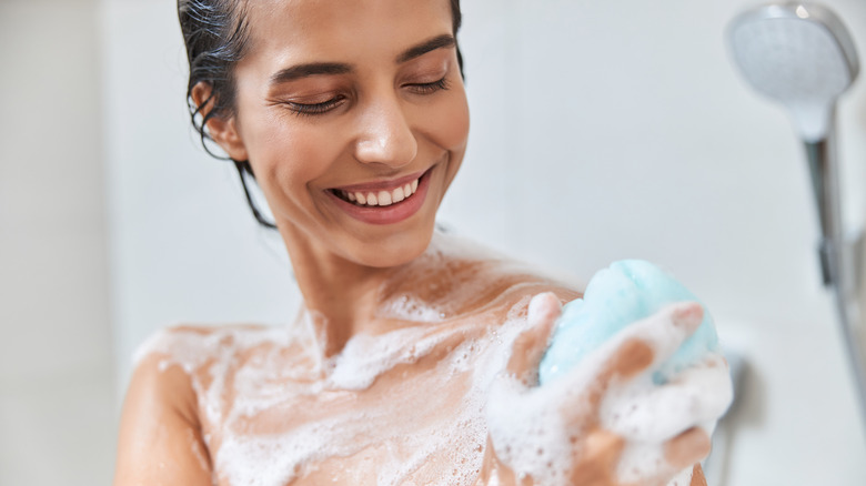 woman soaping up in shower