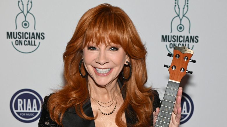 Reba McEntire smiles during Musicians On Call: Music Heals Live! in May 2026.
