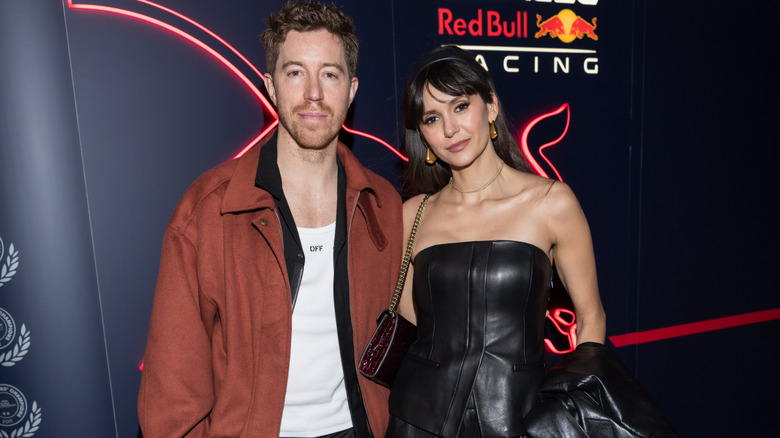 Nina Dobrev and Shaun White at a red caret event.
