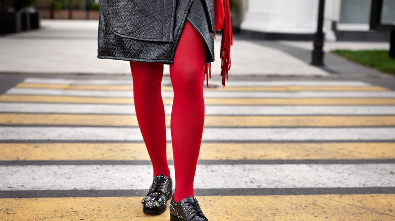 woman wearing red tights