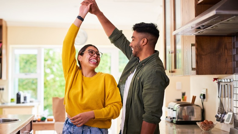 Couple dancing in the kitchen