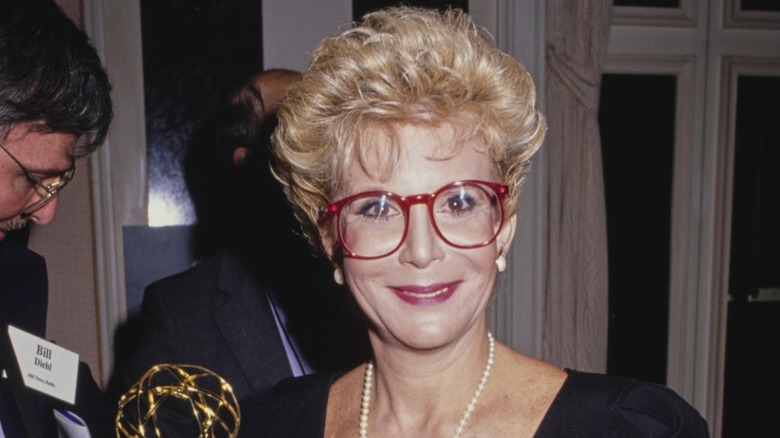 Sally Jessy Raphael wore a black dress with a pearl necklace and her signature red glasses along with her short blond hair while attending the 16th Annual Daytime Emmy Awards in New York City in 1989.