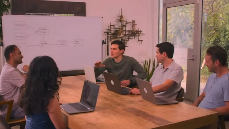 Charlie Greene and Remento team in a meeting
