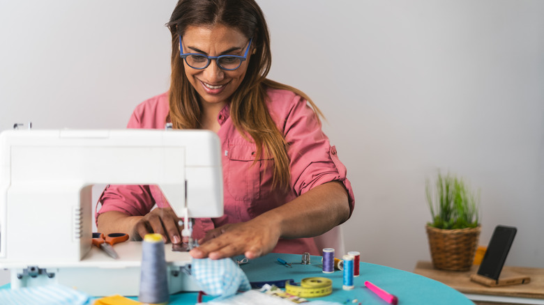 woman with sewing machine