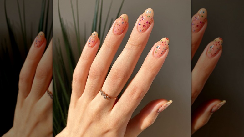 rounded neutral nails colorful gems