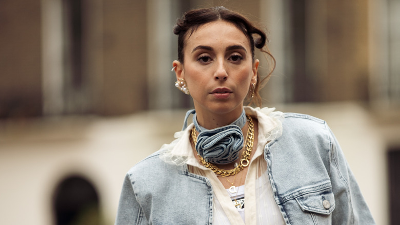 woman wearing denim rose choker