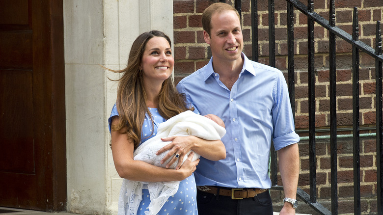 The Prince and Princess of Wales with Prince George in 2013