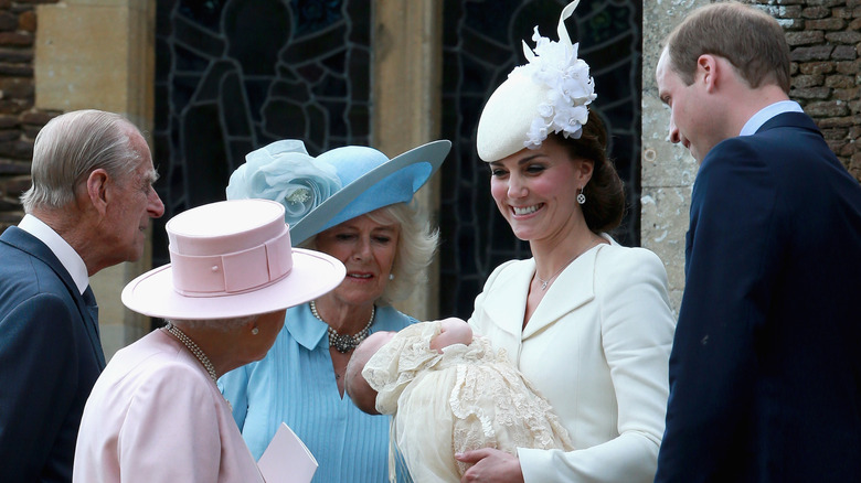 Kate Middleton and Prince William baptizing Princess Charlotte