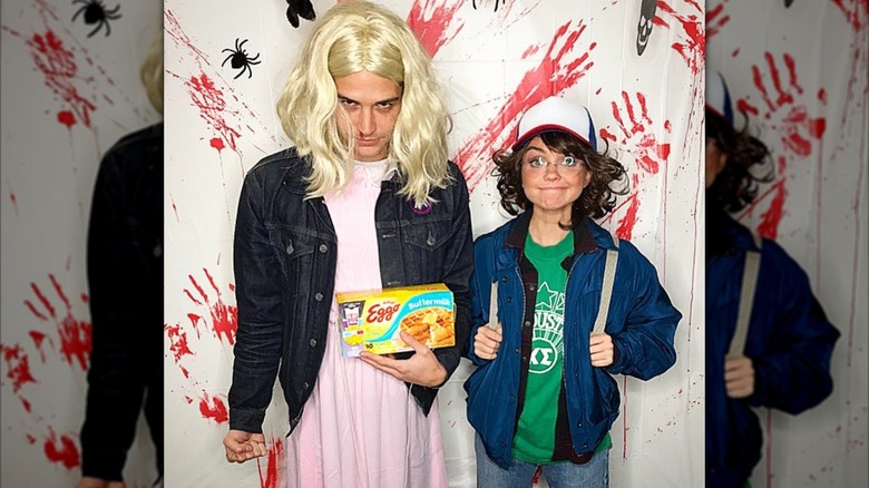 Sarah Hyland and Adams Wells dressed as Stranger Things characters for Halloween.