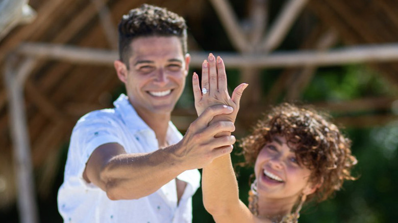 Wells Adams and Sarah Hyland show off engagement ring after beach proposal