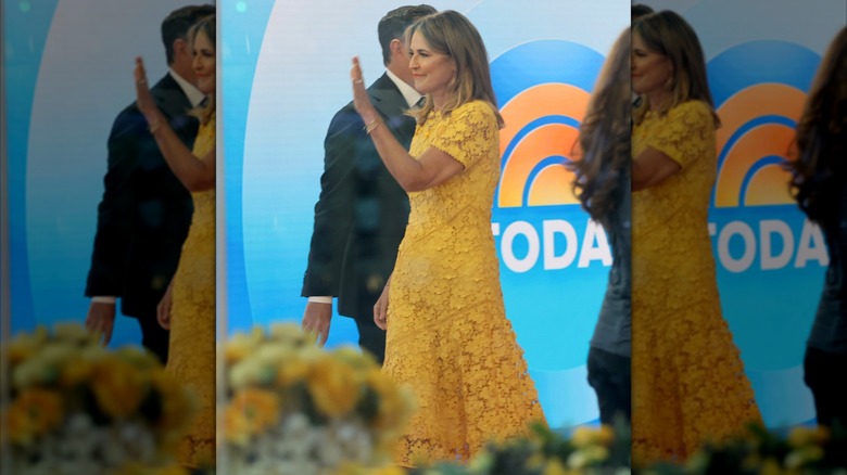 Savannah Guthrie waves to co-workers when returning to The Today Show stage in April 2026