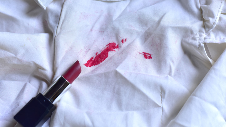 Lipstick stain on white shirt