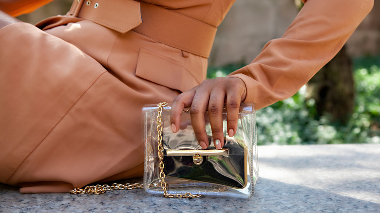 Woman with clear purse