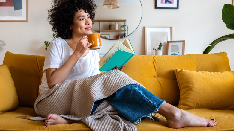 woman sitting on the couch