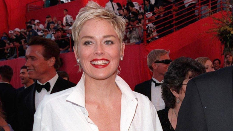 70th ANNUAL ACADEMY AWARDS AT THE SHRINE AUDITORIUM ARRIVALS: SHARON STONE AND HUSBAND