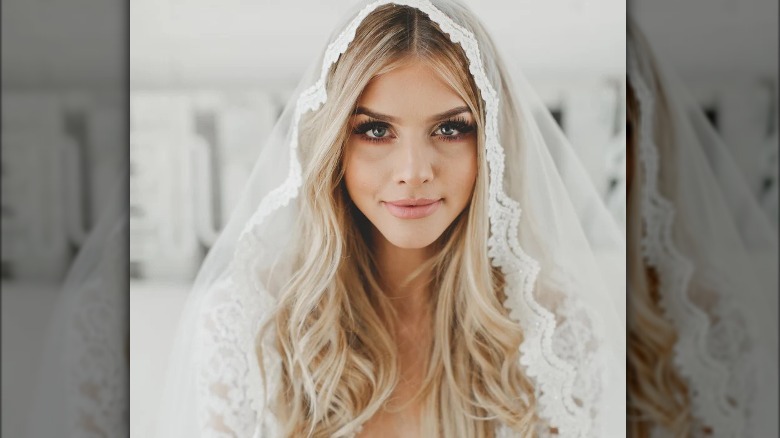 Bride wearing mantilla veil