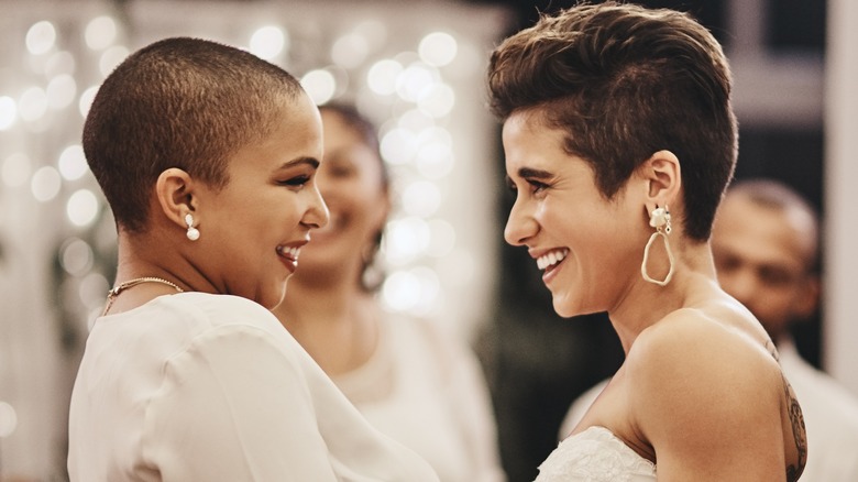 Gay couple dancing at wedding