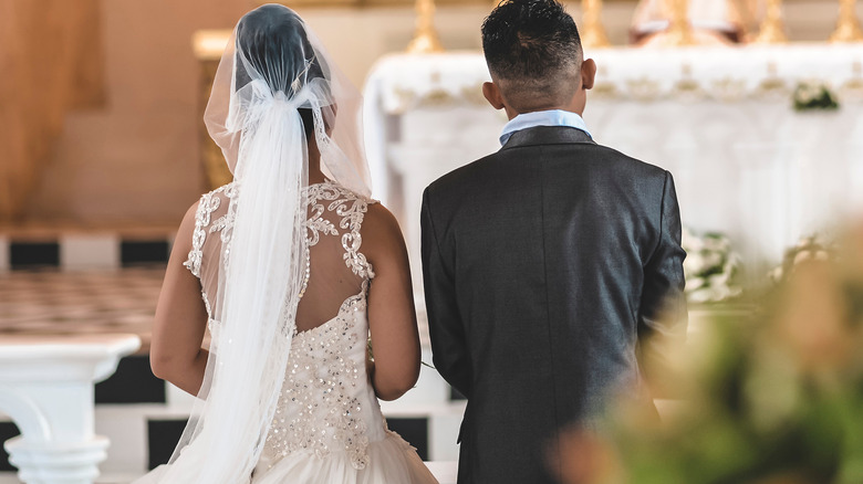 Bride and groom at altar