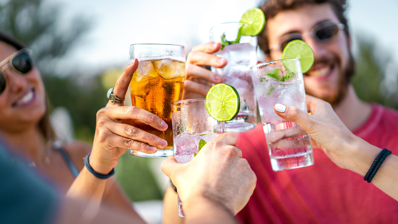 people toasting drinks