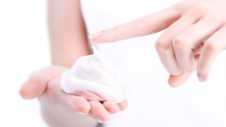 Woman with shaving cream