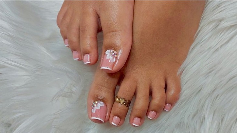 French pedicure with flowers