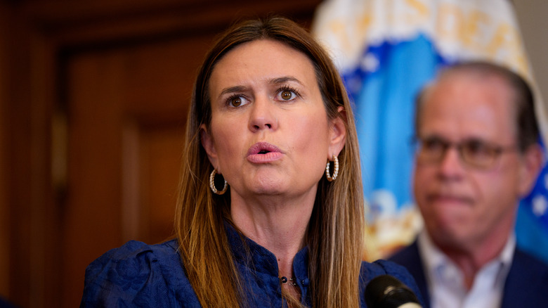 ﻿Sarah Huckabee Sanders speaking before U.S. Agriculture Secretary Brooke Rollins