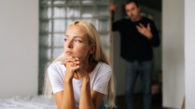 Woman ignoring upset partner