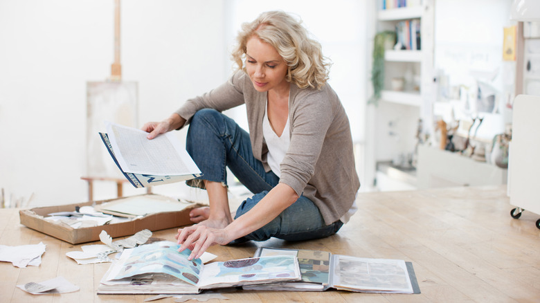 woman flipping through a magazine