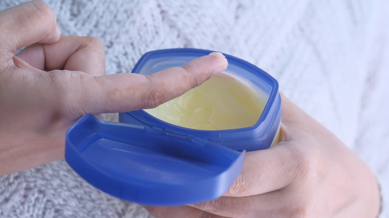 hand holding Vaseline