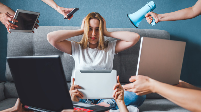 Woman feeling anxious while working