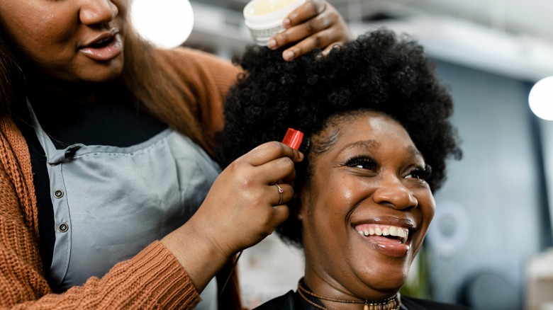 Black woman at hair salon