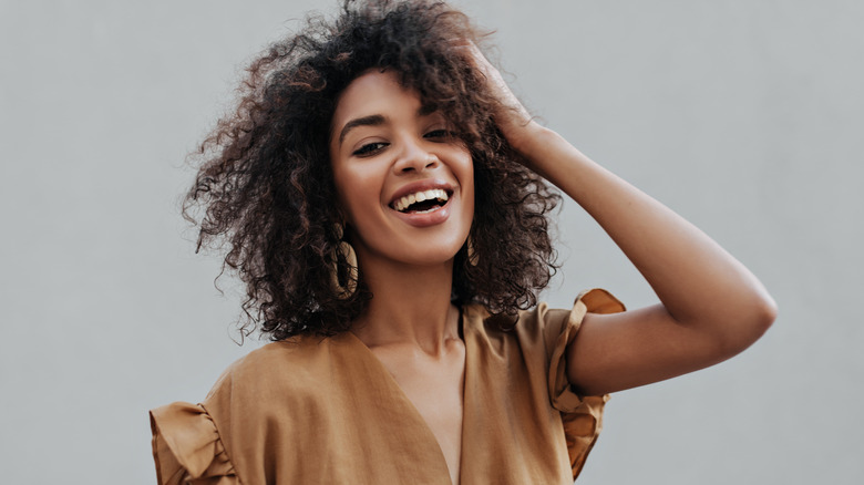 woman touching hair