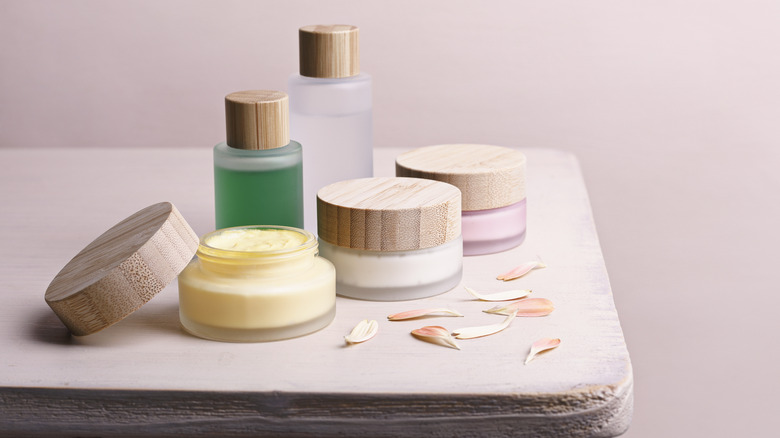 Multiple skincare bottles on a counter