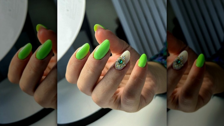 Woman with a gem on the nail