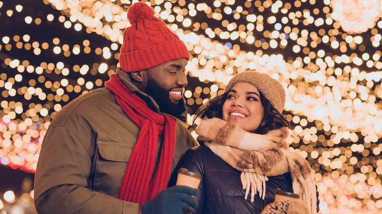 Couple standing outside in winter