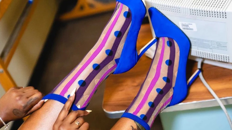 Sock Candy sheer socks with purple stripes and cobalt blue dots with blue pointy heels