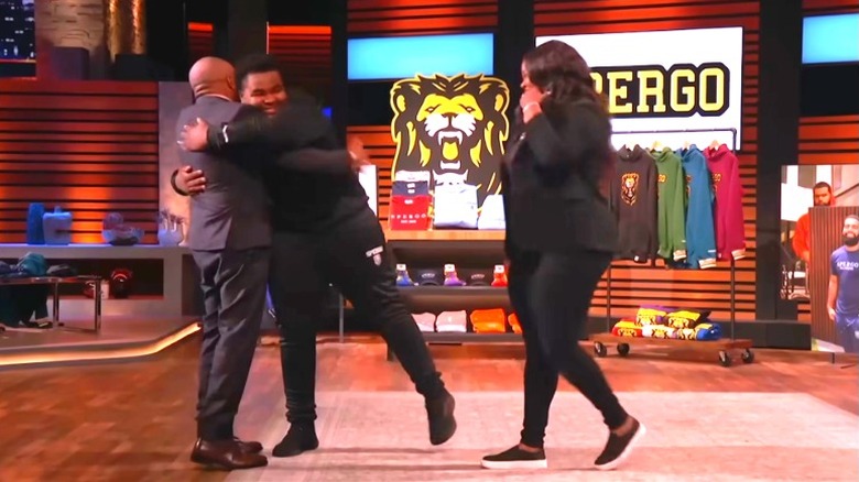 Brown and John hug on "Shark Tank"